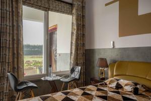 Foto dalla galleria di Luxury Farmhouse Stay, Pure Vegetarian- Santushti Farm, NCR a Tibri