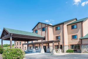 a rendering of a hotel with a building at Super 8 by Wyndham Columbia East in Columbia
