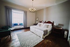 Posteľ alebo postele v izbe v ubytovaní Hotel Aguere