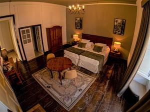 Postel nebo postele na pokoji v ubytování Hotel Aguere