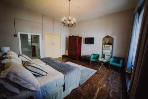 Postel nebo postele na pokoji v ubytování Hotel Aguere