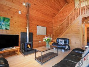 TV a/nebo společenská místnost v ubytování Eden