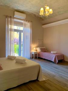 Postel nebo postele na pokoji v ubytování CERNAIA ROOM