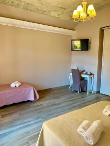 Postel nebo postele na pokoji v ubytování CERNAIA ROOM