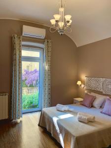 Postel nebo postele na pokoji v ubytování CERNAIA ROOM