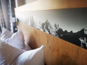 Postel nebo postele na pokoji v ubytování Gasthof & Hotel Zur Post