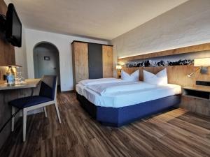 Postel nebo postele na pokoji v ubytování Gasthof & Hotel Zur Post