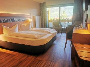 Postel nebo postele na pokoji v ubytování Gasthof & Hotel Zur Post
