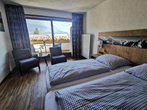 Postel nebo postele na pokoji v ubytování Gasthof & Hotel Zur Post