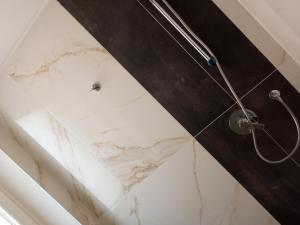 Koupelna v ubytování Hotel Orchidea