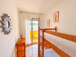 Posteľ alebo postele v izbe v ubytovaní VACAY Villa Mateua, a paso de playa, en Costa Brava, L'Escala! + 37 fotografií