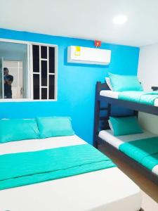 En eller flere senge i et værelse på APT Duplex - Cerca al Centro Edf Frente a la playa B-4-5
