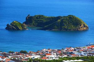 a small island in the middle of the ocean at Casa do Ilhéu in Vila Franca do Campo