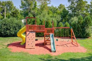 a playground with a slide and a slideintend at Lakeside Delight, unit 423 in Laconia