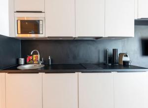 Kuchyňa alebo kuchynka v ubytovaní Studio Moderne à Tours