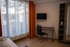 Fotografie z fotogalerie ubytování Hotel am Nikolaiort v destinaci Osnabrück