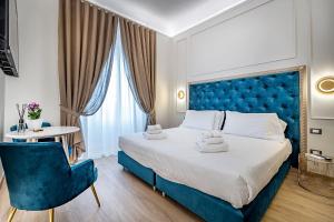 A bed or beds in a room at Residenza Giotto