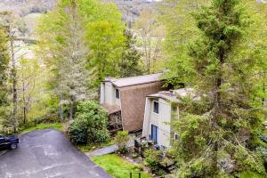 an aerial view of a house with a driveway at Sugar Mountain Serenity in Banner Elk