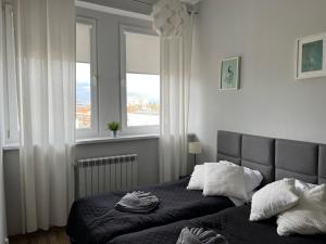 Postel nebo postele na pokoji v ubytování Business Center