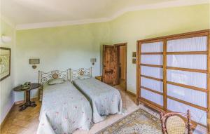 Posteľ alebo postele v izbe v ubytovaní Villa Pian Di Marte