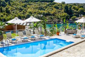 The swimming pool at or close to Villa Alexandra Karvouno Villas