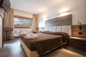 Katil atau katil-katil dalam bilik di Hotel Ciclamino