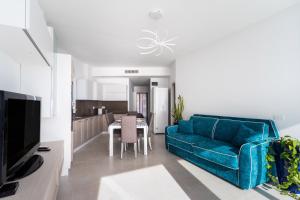 TV a/nebo společenská místnost v ubytování Suite Buena Vista