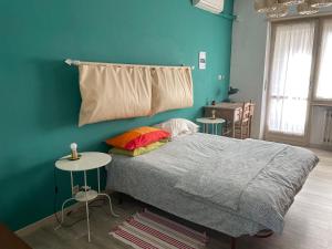 Postel nebo postele na pokoji v ubytování Appartamento luminoso