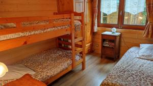 Posteľ alebo postele v izbe v ubytovaní Appartement dans petit chalet + 16 fotografií