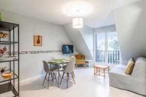 Televízia a/alebo spoločenská miestnosť v ubytovaní Appartement Cassulo - Welkeys