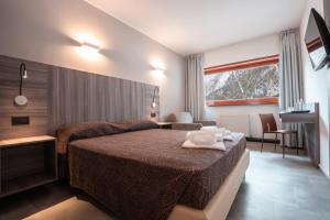 Katil atau katil-katil dalam bilik di Hotel Ciclamino