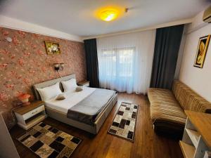 Voodi või voodid majutusasutuse Hotel Suprem toas