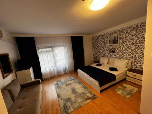 Voodi või voodid majutusasutuse Hotel Suprem toas