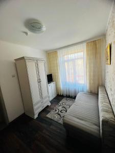 Voodi või voodid majutusasutuse Hotel Suprem toas