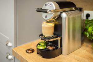 Coffee and tea making facilities at Jimmy's Apartments Emerald
