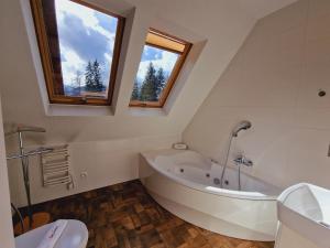 Kúpeľňa v ubytovaní ZAKOapartamenty BUTOROWY RESIDENCE + 37 fotografií