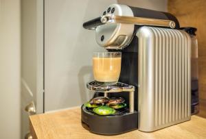Coffee and tea making facilities at Jimmy's Apartments Emerald