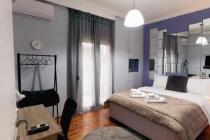 Krevet ili kreveti u jedinici u objektu Charming 85sqm Apartment with Panoramic City-Views