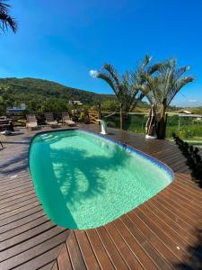 Πισίνα στο ή κοντά στο Bangalô house - Praia do Rosa SC