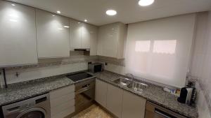 A kitchen or kitchenette at Atico duplex en Malgrat de Mar