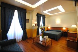 Posteľ alebo postele v izbe v ubytovaní Hotel Verona Rome