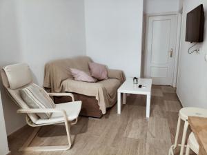 Televízia a/alebo spoločenská miestnosť v ubytovaní Apartamento Conil Gades Nömada B