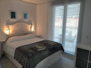 Posteľ alebo postele v izbe v ubytovaní Terraza del Bajondillo Torremolinos
