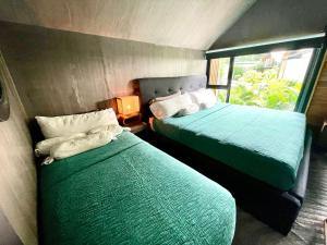 Postel nebo postele na pokoji v ubytování Studio Aloha - Malpais