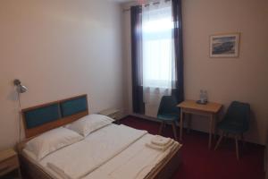 Posteľ alebo postele v izbe v ubytovaní Motel Subaru