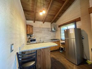 Dapur atau dapur kecil di cabañas Mazzatl jacuzzy