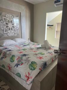 Rúm í herbergi á Curasita Colour Appartments & Resort - adres kaya Sucre nst 282