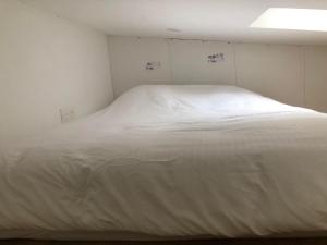 Posteľ alebo postele v izbe v ubytovaní F2 équipé, 15mn de Paris, parking, climatisation
