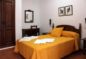 Cama o camas de una habitación en Apartamentos Casa Gil