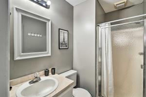 a bathroom with a sink and a shower at Updated Fayetville Townhome-Away-From-Home with Yard in Fayetteville +22 photos